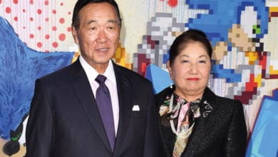 SEGA Sammy CEO with his wife